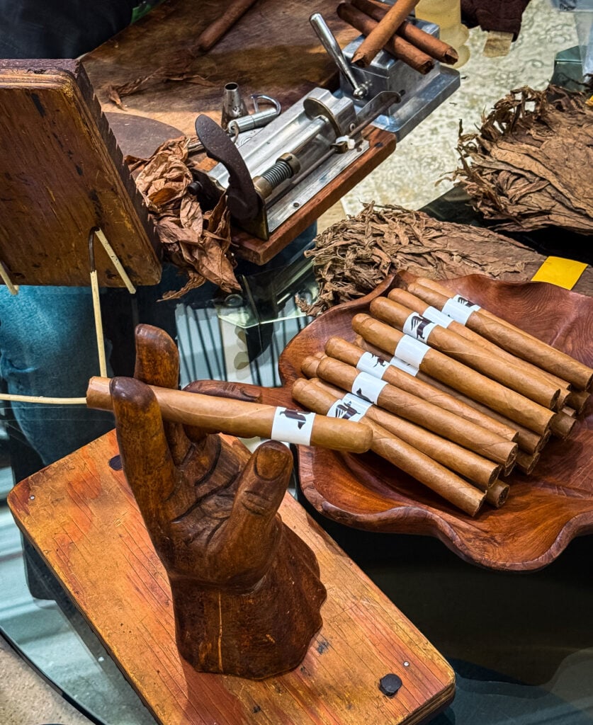 Williams Cigars hand-rolling cigars for guests at the A Private Affair vignette reveal at Dallas Market Center 2026